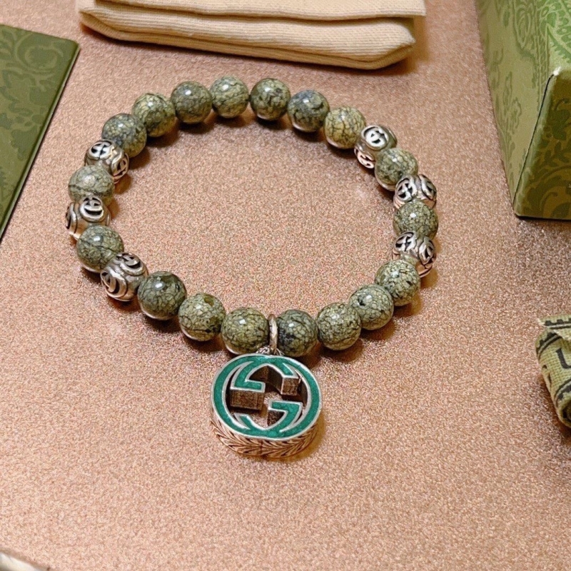 G*u*i bracelets